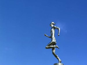 metal steel running person landscape sculpture