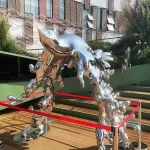 Stainless Steel Sculpture of flying Birds and Water in the City urban