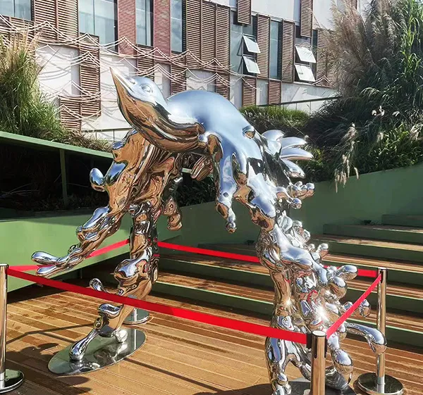 Stainless Steel Sculpture of flying Birds and Water in the City urban