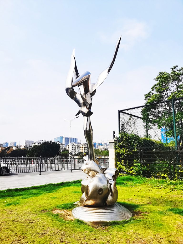 abstract seagull sculpture stands at road side