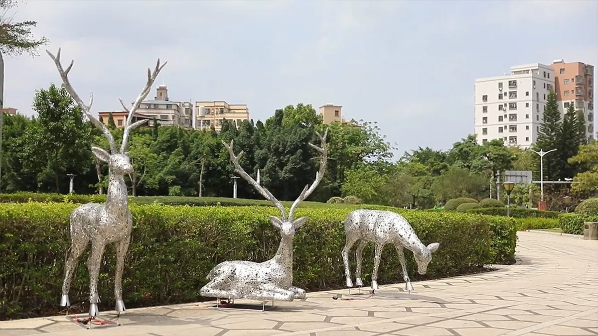 three outdoor steel metal deer sculpture width different postures